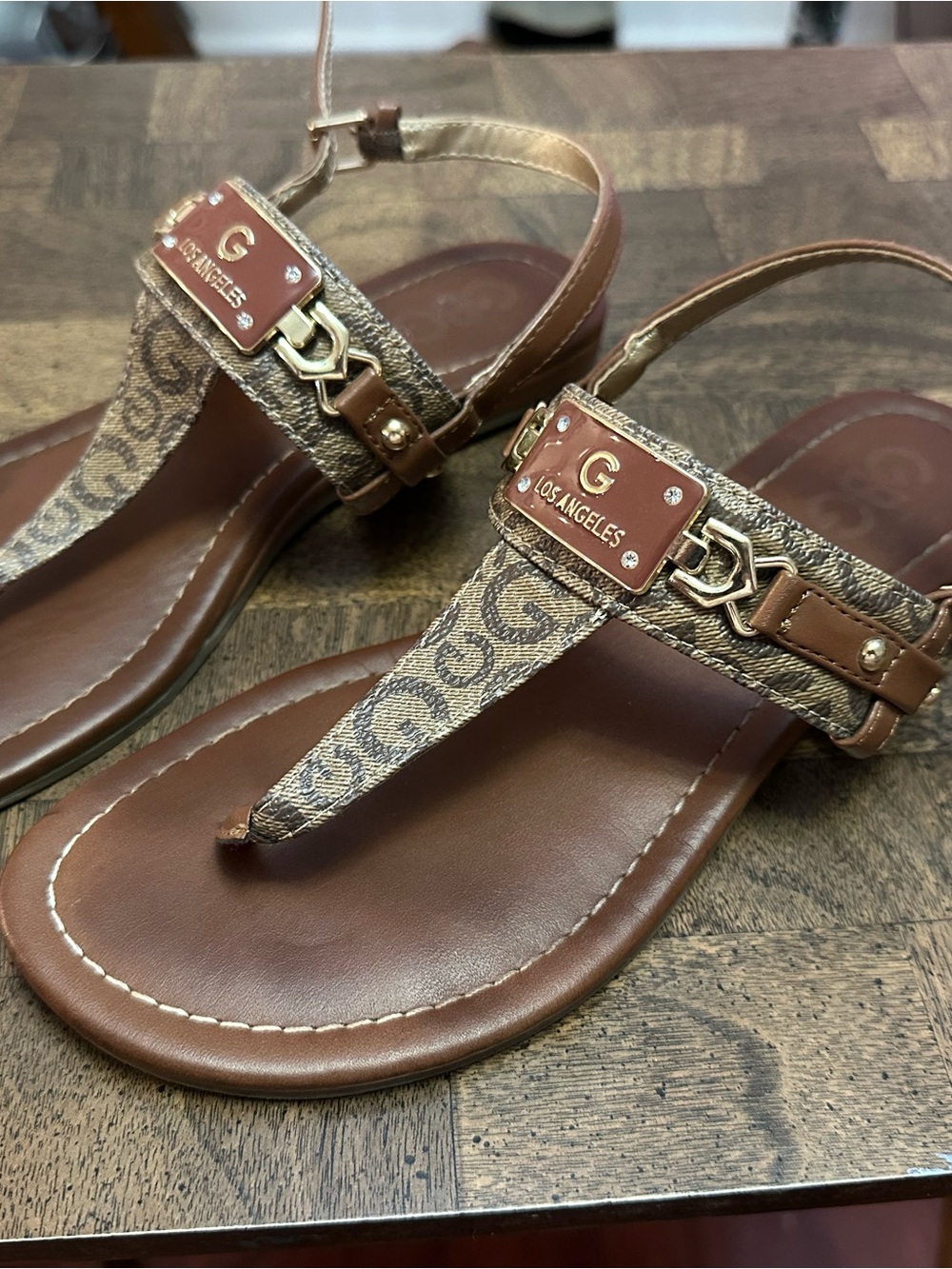 GBG Los Angeles Brown Logo Thong Sandals with Gold Accents